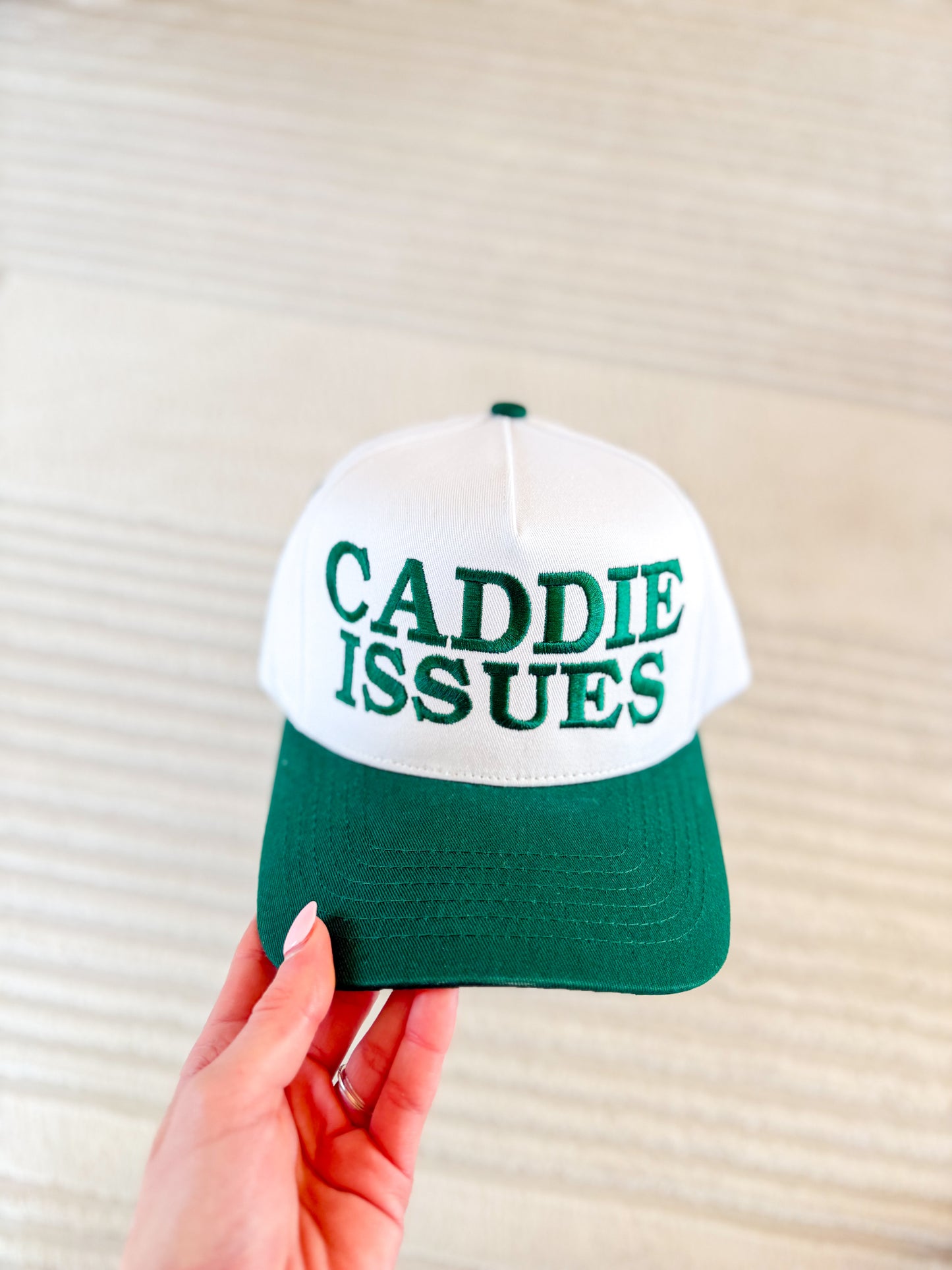 Caddie Issues Trucker Hat